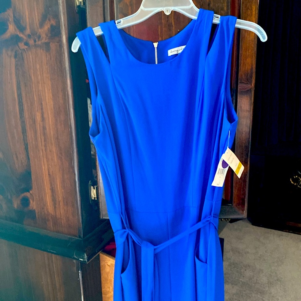 Sleeveless purple jumpsuit with pockets and zipper and back